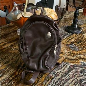 Small Tumi Backpack Purse